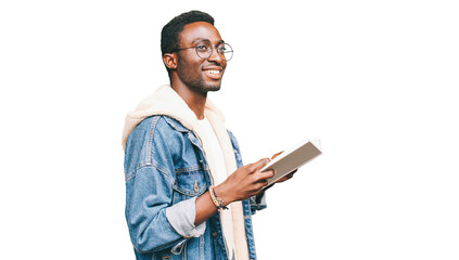 Wall Mural - Portrait of smiling young african man student with book looking away wearing eyeglasses isolated on white background
