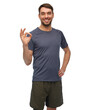 © Syda Productions - fitness, sport and healthy lifestyle concept - smiling man in sports clothes showing ok gesture over white background