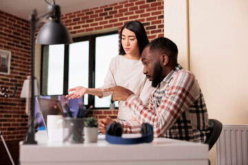 Software developers using coding terminal window on laptop, programming new online app interface with css html script. Developing encryption source with firewall and cloud computing.