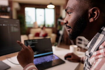 african american it engineer programming binary code interface, using css html script and encryption
