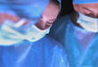 © lenets_tan - Team surgeon at work in operating room.