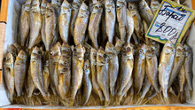 Dried Fish On The Store Counter With A Price Tag