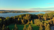 Drone Shot Of Hudson Valley River In Upstate New York With Green Trees And Forest In A Sunset 4K UHD 3840