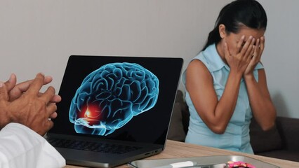 Wall Mural - Doctor showing x-ray of pain in the front of the brain on a laptop with woman. Migraine Headache