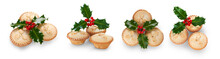 A Collection Of Christmas Mince Pies With Holly Isolated Against A Flat Background.