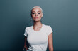 © primipil - Millenial young woman with short blonde hair and big boobs tits portrait