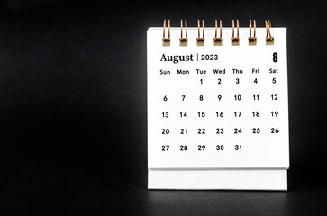 The August 2023 Monthly desk calendar for 2023 year on black background.