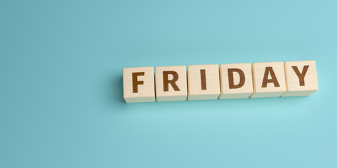 Wall Mural - The word Friday built from letters on wooden cubes. High angle view with copy space