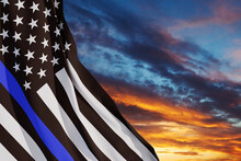 American Flag With Police Support Symbol Thin Blue Line On Sunset Sky. American Police In Society As The Force Which Holds Back Chaos, Allowing Order And Civilization To Thrive. 3d-rendering.