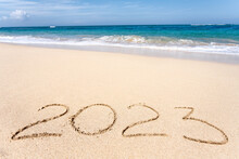 Happy New Year 2023, Lettering On The Beach With Wave