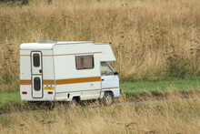 Vauxhall Bedford Rascal 1991 Nipper, 3 Berth, Overcab Bed Campervan Driving Through Parched Summer Countryside