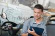 © auremar - a man checking the information