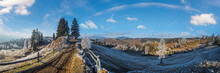 Winter Coming. Last Days Of Autumn, Morning In Mountain Countryside Peaceful Picturesque Hoarfrosted Scene. Dirty Road From Hills To The Village. Ukraine, Carpathian Mountains.