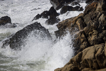 Ocean waves splashing on a rocky shore