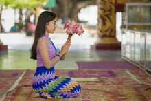 Myanmar Woman Praying And Worship To Buddha At At Sandamuni Pagoda In Mandalay Myanmar