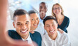 © Sanele G/peopleimages.com - Selfie, collaboration and diversity in a corporate company with a mission and vision for success, growth and innovation. Portrait of happy workers standing together for motivation at team building