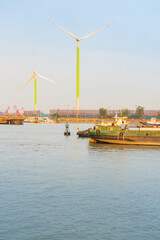 Yangtze River port wharf and wind turbine and sunset scenery in Jiangyin City, China