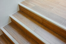 Modern Wooden Staircase With Stair Nosing Strip.