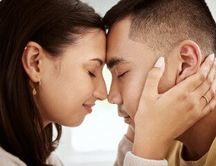 Poster - Dating, man and woman with foreheads against each other in a loving and affectionate closeup. In love, young male and female couple sharing a beautiful moment and smiling after their engagement.