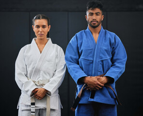 Canvas Print - .Fitness, motivation and discipline karate training with a student and teacher standing proud in a center or dojo. Young woman learning defense, strength and endurance lesson from martial arts coach.