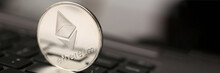Ethereum Silver Coin On Laptop Pc Keyboard