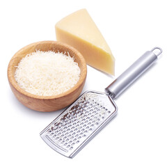 Wall Mural - grated Parmesan cheese in wooden bowl and grater isolated on white background