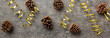 New Year composition. Christmas decor background with pine cones. Top view with copy space