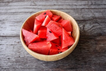 Wall Mural - Watermelon summer fruit on wood background