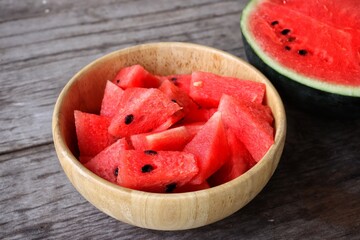 Wall Mural - Watermelon summer fruit on wood background