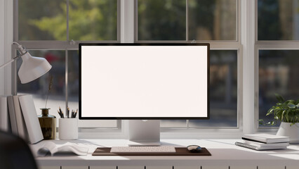 Canvas Print - modern minimal office desk workspace against the window with computer and office accessories