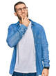 © Krakenimages.com - Young caucasian man wearing casual clothes thinking worried about a question, concerned and nervous with hand on chin