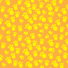 Seamless Pattern Of Yellow Paw Prints On An Orange Background
