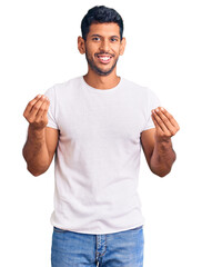 Sticker - Young latin man wearing casual clothes doing money gesture with hands, asking for salary payment, millionaire business