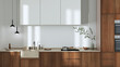 Japandi trendy wooden kitchen in white and beige tones. Wooden cabinets and marble top. Minimalist interior design