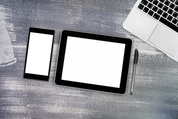 Sticker - Tablet and smartphone with blank screen on desk. Business