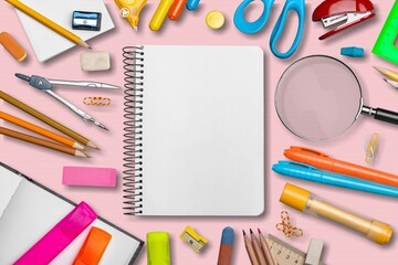 Poster - Back to school concept. Notepads pens erasers on  background