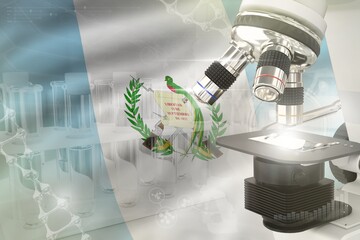 Wall Mural - Microscope on Guatemala flag - science development digital background. Research of healthcare design concept, 3D illustration of object