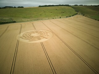 Poster - Aerial view of crop circles in a vast agricultural field in the countryside of Wiltshire, England