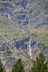 Wall Mural - view to the spanish pyrenees with a waterfall in the mountain