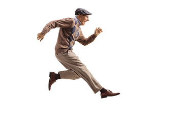 excited elderly man jumping and kicking