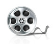 Film reel or movie metal roll with black tape. Isolated on white background.