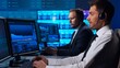 © Acronym - Team of brokers is working in office using workstation and analysis technology. Workplace of professional traders. Global financial markets, business strategy, currency exchange and banking.
