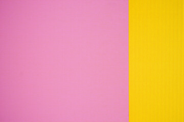 Pink and yellow two tone color paper background with stripes. Abstract background modern hipster futuristic. Texture design