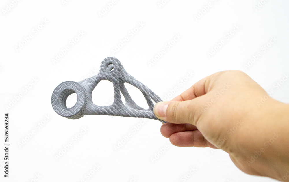 Person holding plastic model printed on powder 3d printer from powder ...