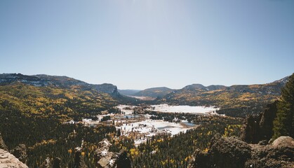 Sticker - Beautiful landscape of a lake in a snowy forest in a mountainous area