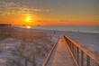 © Larry  - Boardwalk to the Sunrise Gulf Shores Public Beach  101 Gulf Shores Pkwy. Gulf Shores Alabama   Photo taken on September 27, 2021    A boardwalk leads to the beach and the rising sun.