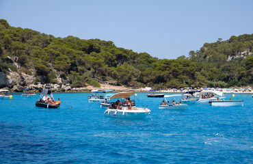 Menorca, Spain: Beautiful bay with sailing boat catamaran