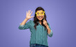 © Syda Productions - party props, photo booth and people concept - happy woman with big glasses in shape of stars waving hand over violet background