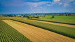 © Greg Kelton - Drone View of Amish Countryside With Barns and Silos and Corn, Patch Work of Color and Corps, on Sunny Day.