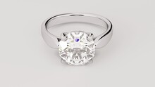 Close-up View Of A Diamond Proposal Ring Isolated On The White Background